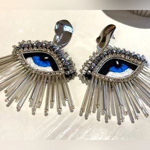 Silver evil eye statement earrings